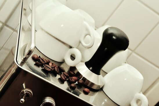 Automatic and traditional espresso machines side by side